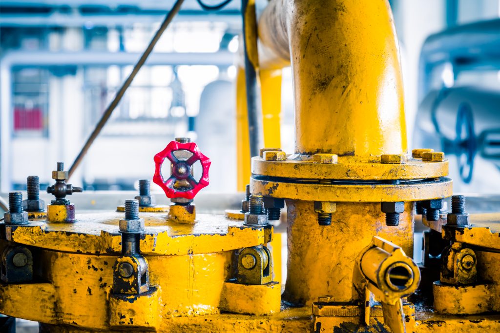 steel pipelines and cables in a plant